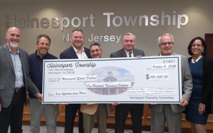 Committee and School Representatives with Check for $100k